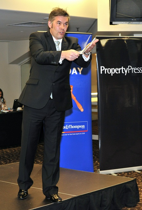 Campbell Scott 'in action' performing his winning call at the Barfoot & Thompson Auctioneers' Champs in Auckland.