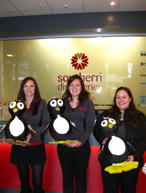 Southern Discoveries team members with their family of penguins (L-R) Claire Blackadder, Naomi Osborne and Jenni Robertson