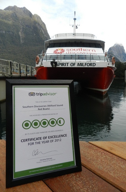 Southern Discoveries in Milford Sound and the Trip Advisor certificate.