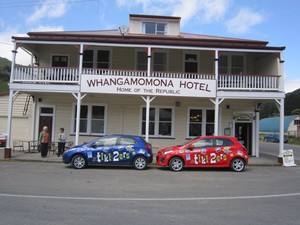  Two cars, branded top to toe in iconic Kiwi imagery, have been travelling the length and breadth of the country visiting cities and towns outside the famous Whangamomona Hotel on Taranaki's Forgotten Highway