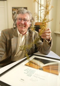 Philip Simpson with his award and part of a Totara branch