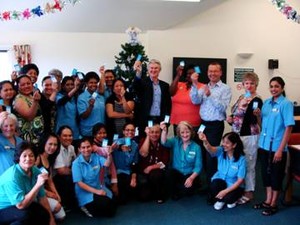 *Auckland's Radius Arran Court rest home staff delighted to be presented with their special discount cards by CEO Brien Cree (centre) - Radius Residential Care is the only aged care provider to give valued employees this special discount card.