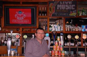 Operator of The Flying Moa, Lance Campbell, inside the restaurant. . 