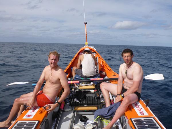 James Blake and Nigel Cherrie take a break on day 16 of Team Gallagher's row from Auckland to New Zealand.