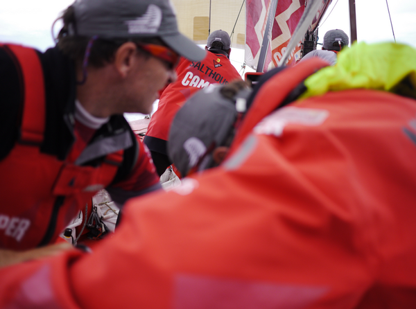 A frenzy of action onboard CAMPER as they escape the weather trough.