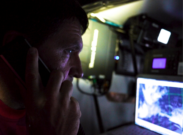 Will Oxley at CAMPER's nav station on Day 9.