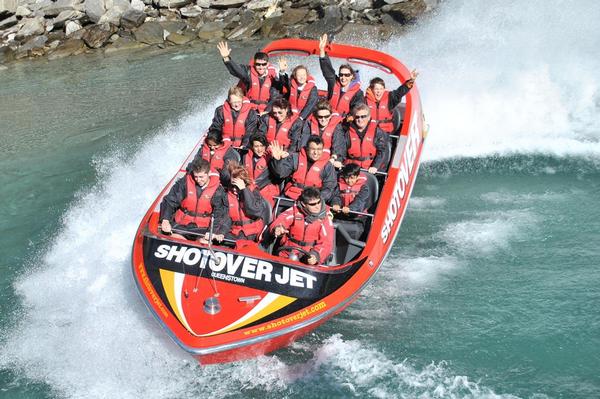 Shotover Jet boat driver Wayne Paton takes passengers for a spin in one of the company's new jet boats on the Shotover River, Queenstown.