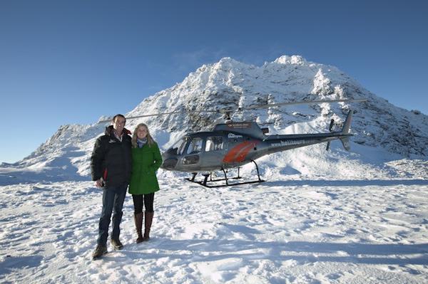 Heli Tours owner Paul Mitchell with wife Katherine and one of his Heli Tours Squirrel helicopters. 