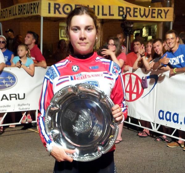 Sophie Williamson holds the trophy.