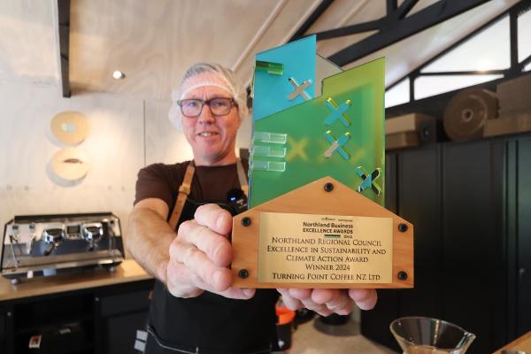 Stu Hargie with his trophy for the Excellence in Sustainability and Climate Action Award.