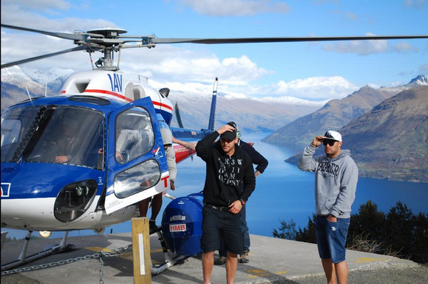  Simon Mannering (left) and Feleti Mateo step off the helicopter on Bob's Peak above Queenstown.