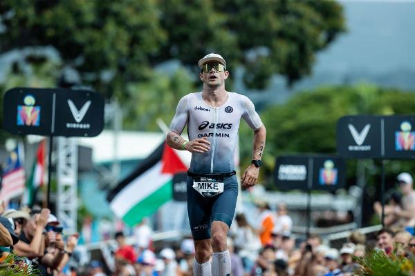 MIke Phillips finishing the VinFast IRONMAN World Championship