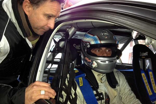 V8SuperTourers CEO Paul Radisich asks Blenheim's Hugh Gardiner his first impressions after being awarded an official test of the prototype car at Hampton Downs today.  