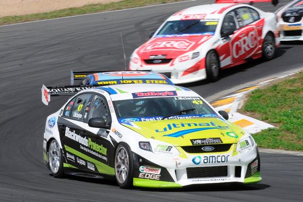 John McIntyre (car #47) races in front of team-mate Steve Richards (car #556) in the opening round of the V8SuperTourers at Hampton Downs, 18 Feb