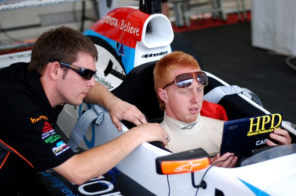 Stefan Webling examines data on his Horizon Energy Miles Toyota race car provided by his Triple X Motorsport engineer Hamish Pemberton as build-up to today's 15-lap opening race at the brand-new Hampton Downs circuit.