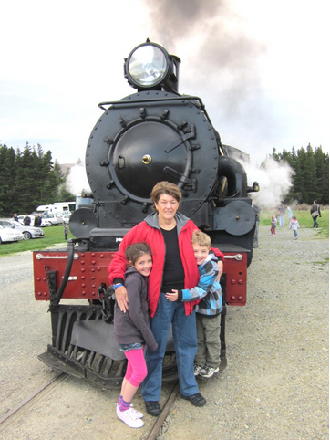 Lucy Norton (7), Sue Roberts and Hugo Norton (6) of Queenstown at the Kingston Flyer Gala Opening Day.