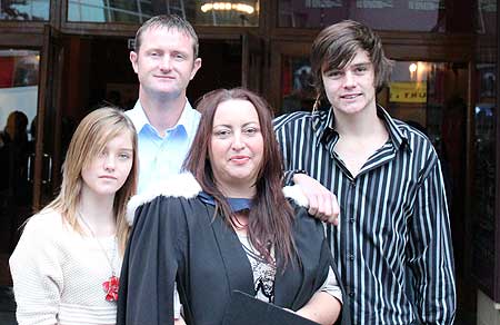 Michaela Gallear with her family, husband Simon and children Megan and Jack. Her parents in Turkey watched live as she graduated last week through Massey's Graduation Live initiative.  