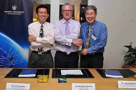 Mr Maharey with Mr Ghee (left) and Mr Kwong at the signing of the memorandum at the New Zealand High Commissioner's residence.