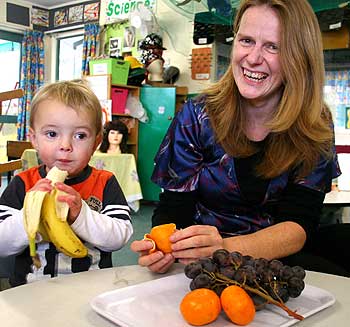 Dr Cath Conlon with Cameron, at Massey University  Albany's early childhood centre.